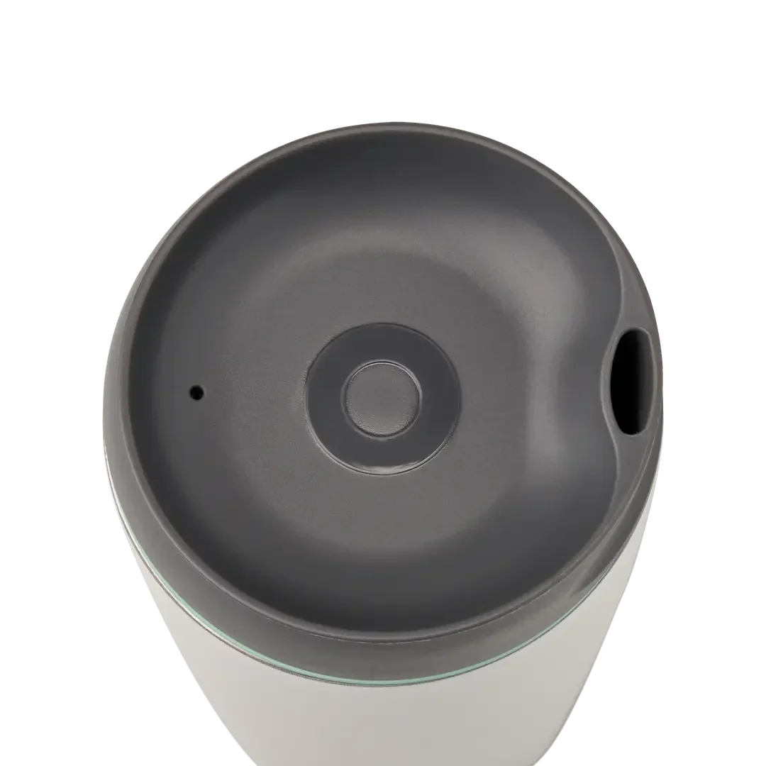 Owala SmoothSip 12oz in white body with gray lid and mint green accent ring, top view